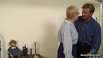 Blonde German granny sucking and fucking with a guy