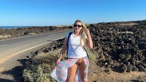 Tourist girl flashing pussy on public road
