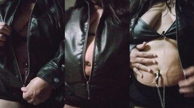 goth girl in leather outfit belly navel plays