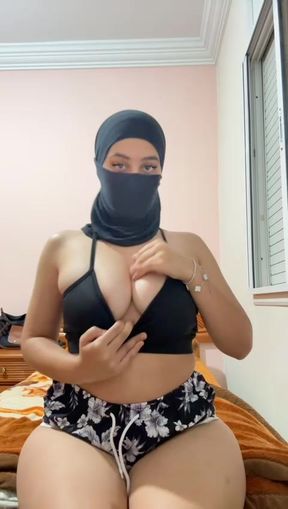 Those Tits Are Muslim. That Face Is Arab. That Hijab Can't Hide Her Dirty Boob Fetish Anymore