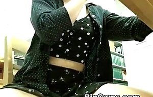 Asian undressing in library