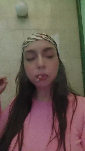 Woman with bandana in bathroom
