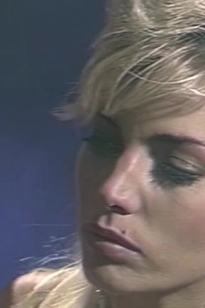 Horny bitch enjoys two massive dicks fucking her holes at a go