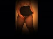 Big tit and booty blonde showing off curves in striptease