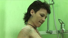 Shorthaired teeny in shower