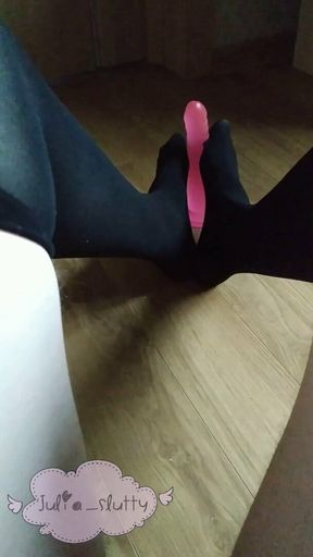 Cute little sissy trying practice footjob in black stockings