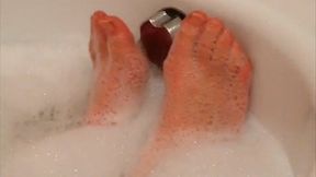 after a long day of work with high heels dasha kelly is having a relaxing bath with bubbles and play with her feet