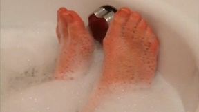 after a long day of work with high heels dasha kelly is having a relaxing bath with bubbles and play with her feet