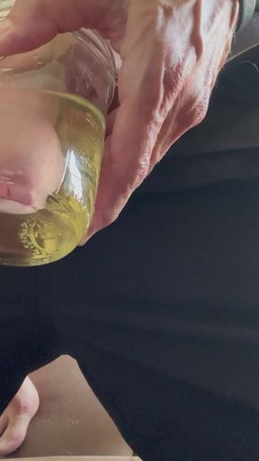 Key moment from "Erotic pissing in jar and masturbation"