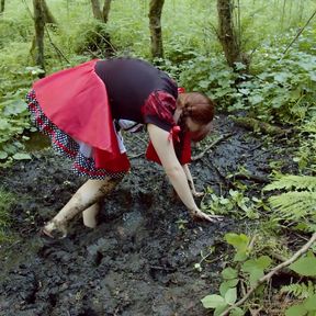 Red Riding hood masturbates in forest mud