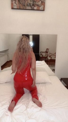 Lick Oil off ass dancing in red catsuit liquid