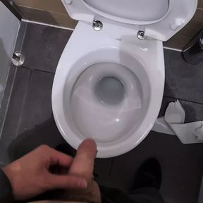 Male peeing in the public toilets during work time