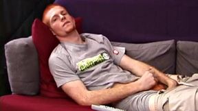 Redheaded Tristian hasn't gotten off in three days, so he is anxious to beat off. Within seconds this cute guy is naked, stroking his dick, and gyrating around on the couch.