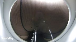 Peeing wetiin pantyhose toilet cam