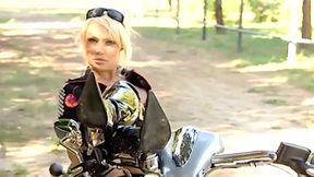 This Beautiful Biker Shows You the Curves of Her Body and Those of Her Motorbike