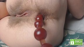 pushing out anal beads without hands from sexy hairy asshole