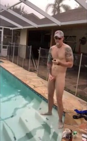 Muscular Hunk Jerks Off by the Pool with a Cigarette