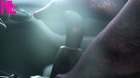 Caressing and footplaying with the wheel and the shift stick in violet patterned pantyhose