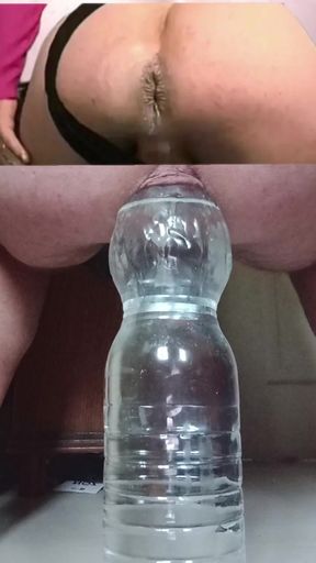 Bottle and dildo