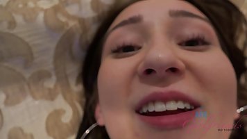 An amateur teen brunette, Carmen Rae likes to give a footjob to her new lover