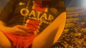 amateur boy in football gear caught wetting himself in the street