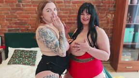 Two College Girls with Big Breasts Smoke Cigarettes and Fuck Each Other with a Double Dildo.