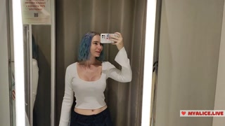 Trying on translucent sexy clothes in a shopping center. Look at me in the fitting room and jerk off