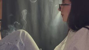 SEPTEMBER ONE FOOT UP, CHEWING GUM AND ENJOYING A CIGARETTE.