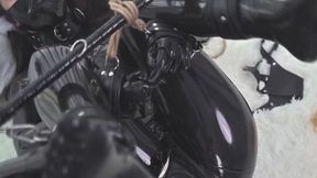 Double ponytail latex girl's legs stepped on