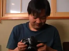 Mature Asian Woman Delivers Explosive Sex Showdown on Vibrant Red Sofa