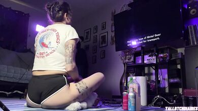 Thick thighs splayed while demolishing Metal Gear Solid 2