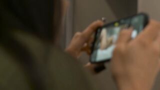 Busty blonde and brunette recording homemade content in a hotel room in Brazil.