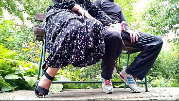 Mature cuckold wife gives handjob in public