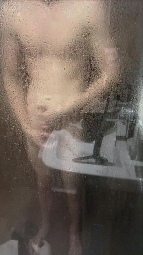Boy takes a shower, jerks off and cums