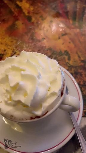 hot blonde milf licks cream on hot chocolate in front of everyone in the cafe