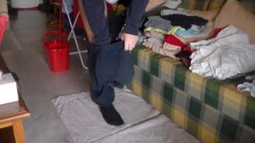 John is pissing on the sofa