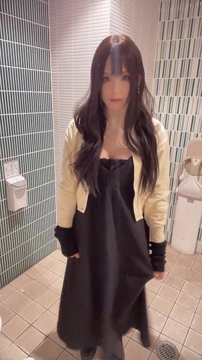 Video of a cross-dresser quietly masturbating in a public restroom