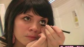 Beautiful brunette teenie does her makeup in a kinky self-shot video