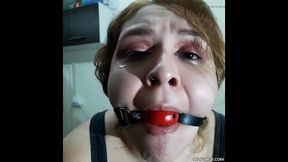 Ball-gagged and drooling South American beauty in bondage
