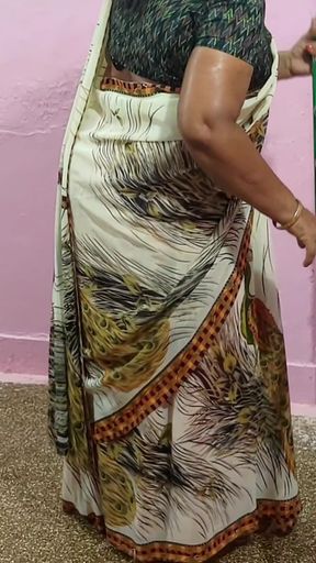 My Stepmother Was Cleaning the Floor with a Mop, so I Held the Saree up so It Wouldn't Fall on the Floor.