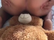 BABYSITTER PLAYS WITH TEDDYBEAR