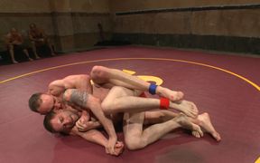 Muscular men wrestle and try ass fucking in a kinky duo
