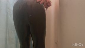 Vincent showers in his black Amoresy catsuit