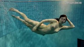 ”Sexy beauty swims in the sea like a mermaid”