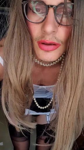 Mistress Jessica dressed up in a vintage white corselette