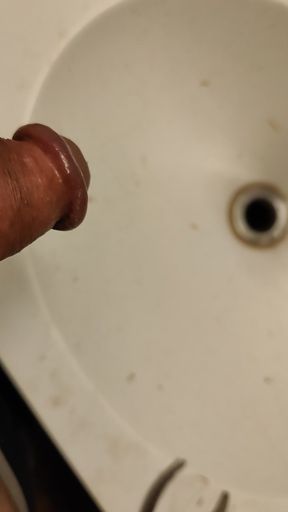 Pissing in a bathroom sink