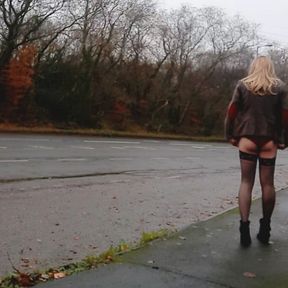 Amateur crossdresser Daisy next to busy main road  .