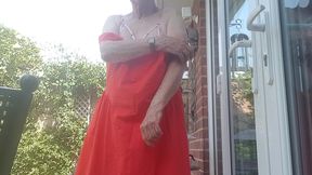Lady in red in the sunshine