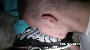 Scaly lad total submissed to the sneakers of boy in jogging