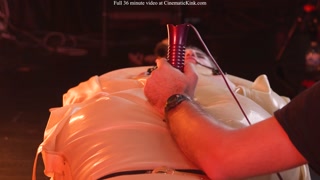 Emily Addams in inflatable latex sack